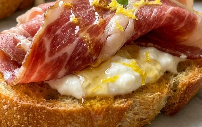 Beef Prosciutto Crostini with Burrata and Lemon Honey Drizzle